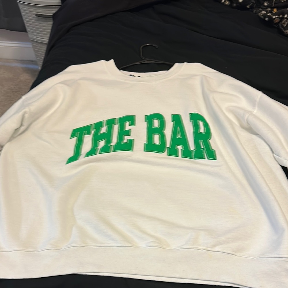 White Sweater with Green Lettering
